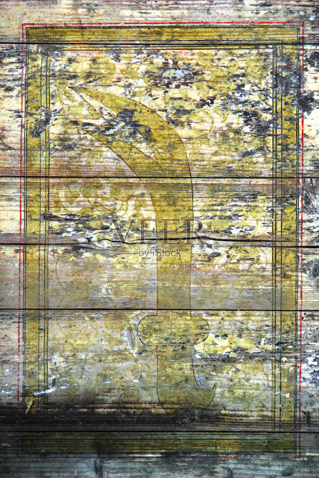 画在一块脏木板上的小雕像照片摄影图片