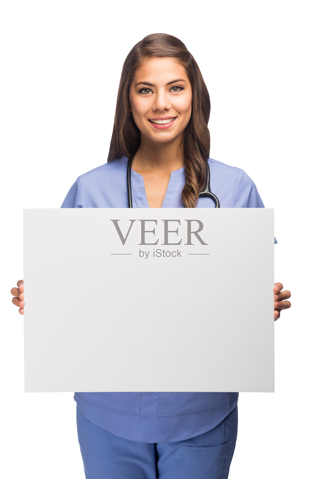 年轻的护士举着牌子在前面照片摄影图片