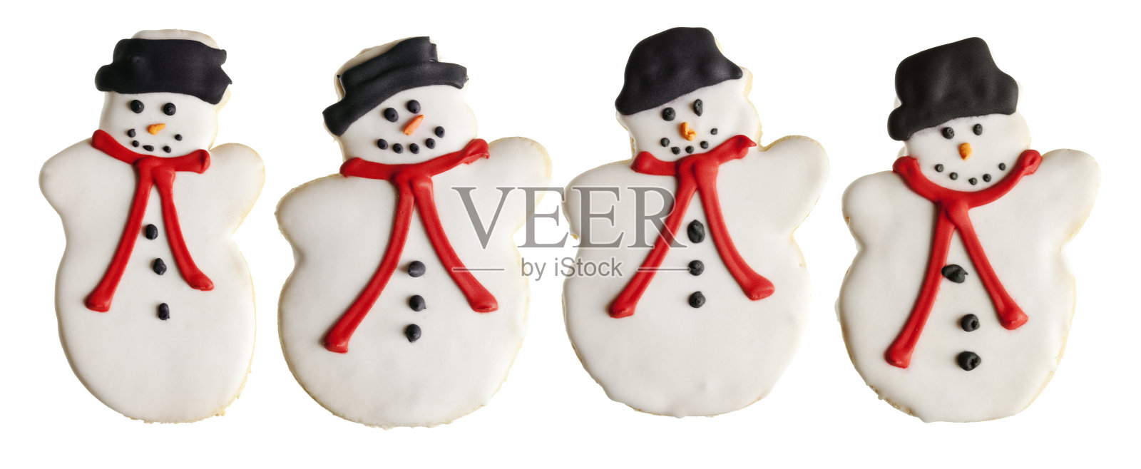 四个圣诞饼干甜点，雪人孤立的白色背景照片摄影图片