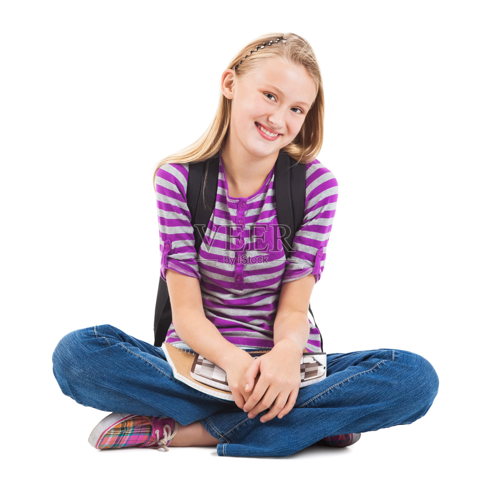 十几岁的女孩与书，孤立在白色照片摄影图片