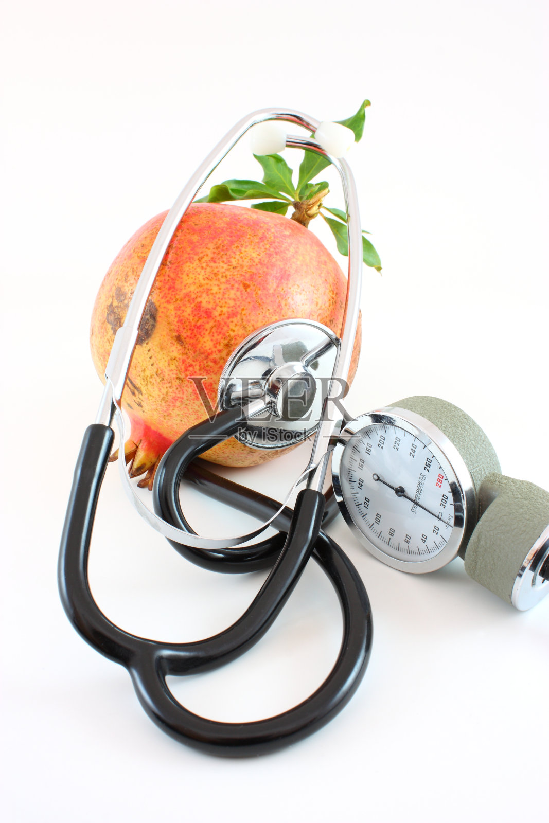 听诊器在石榴照片摄影图片