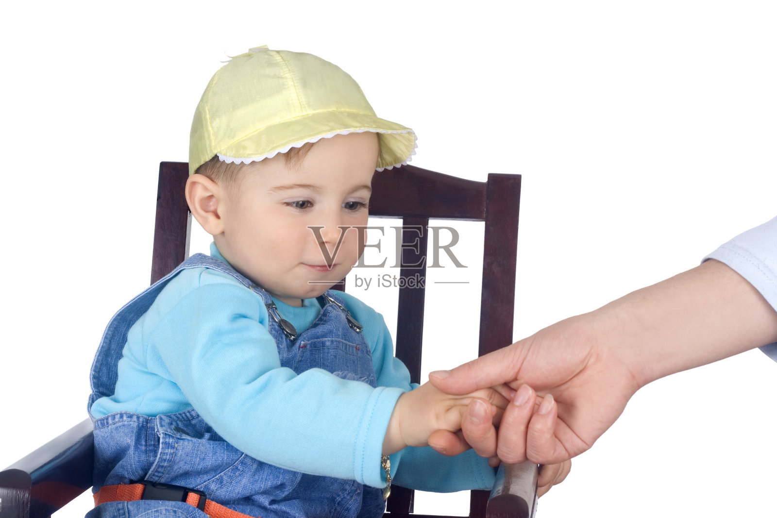 婴儿和男人的手照片摄影图片