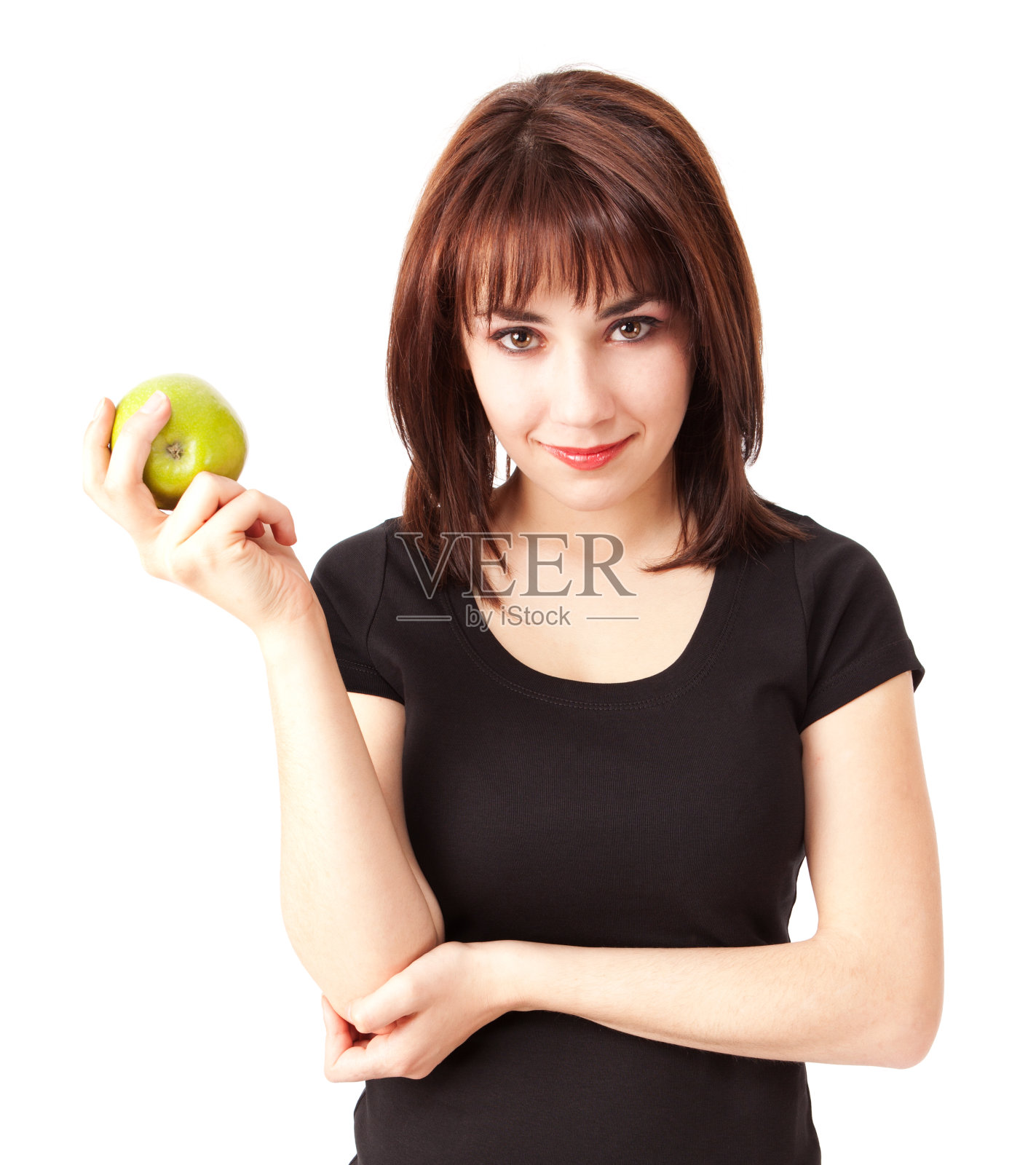 拿着青苹果的年轻女子照片摄影图片