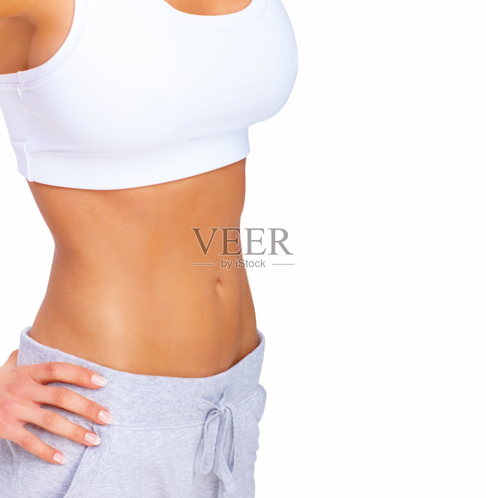 描绘女性健美的腹部-健康概念照片摄影图片