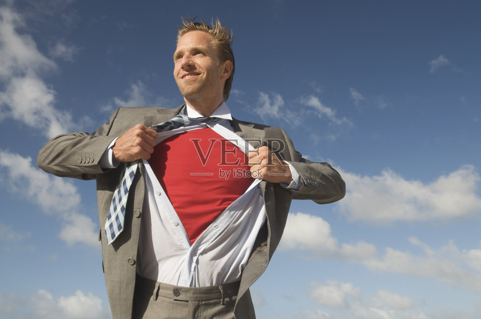 微笑英雄超级英雄商人拯救蓝天照片摄影图片