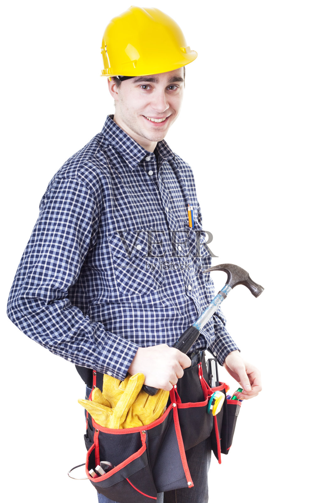 戴着黄色头盔的年轻建筑工人照片摄影图片