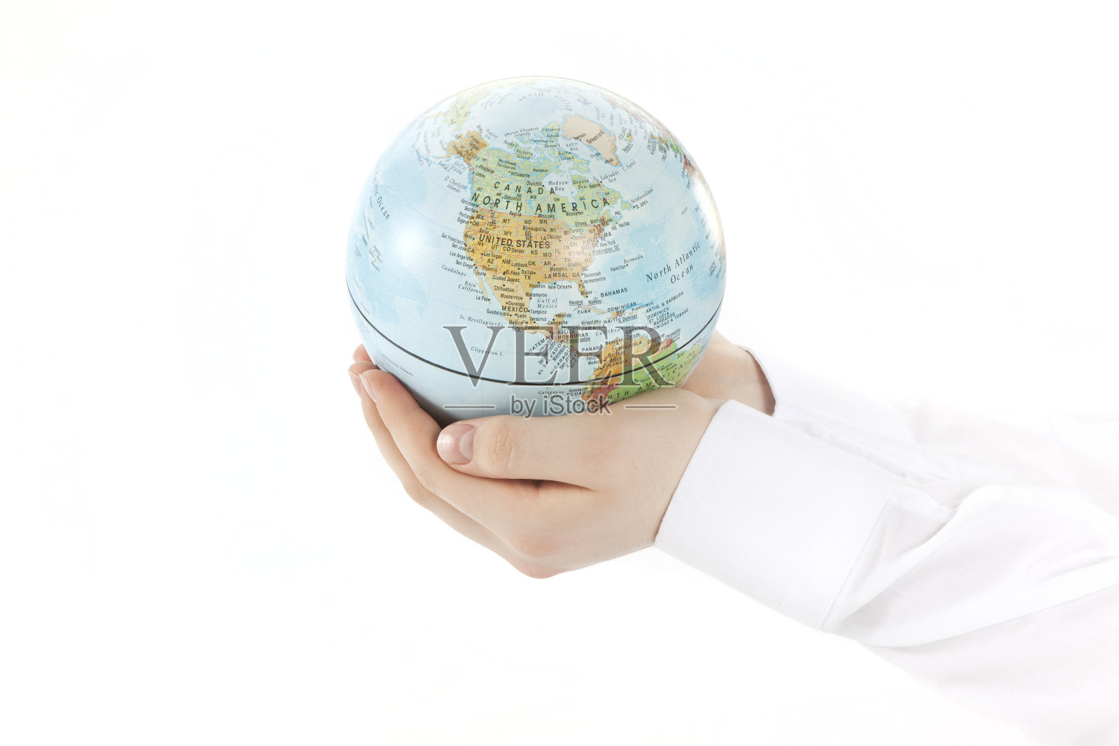 手中的地球仪照片摄影图片