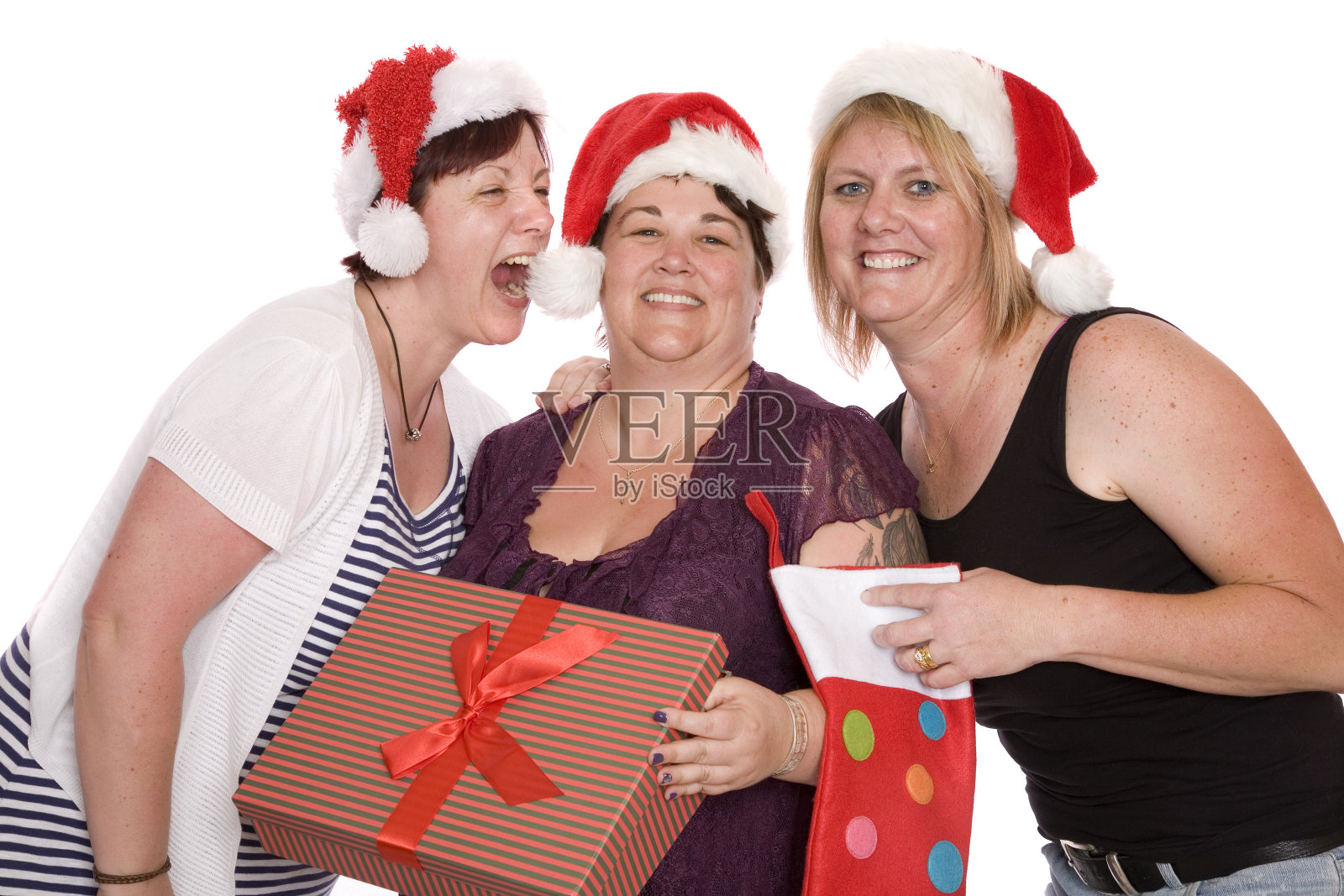 三个女人的圣诞趣事照片摄影图片