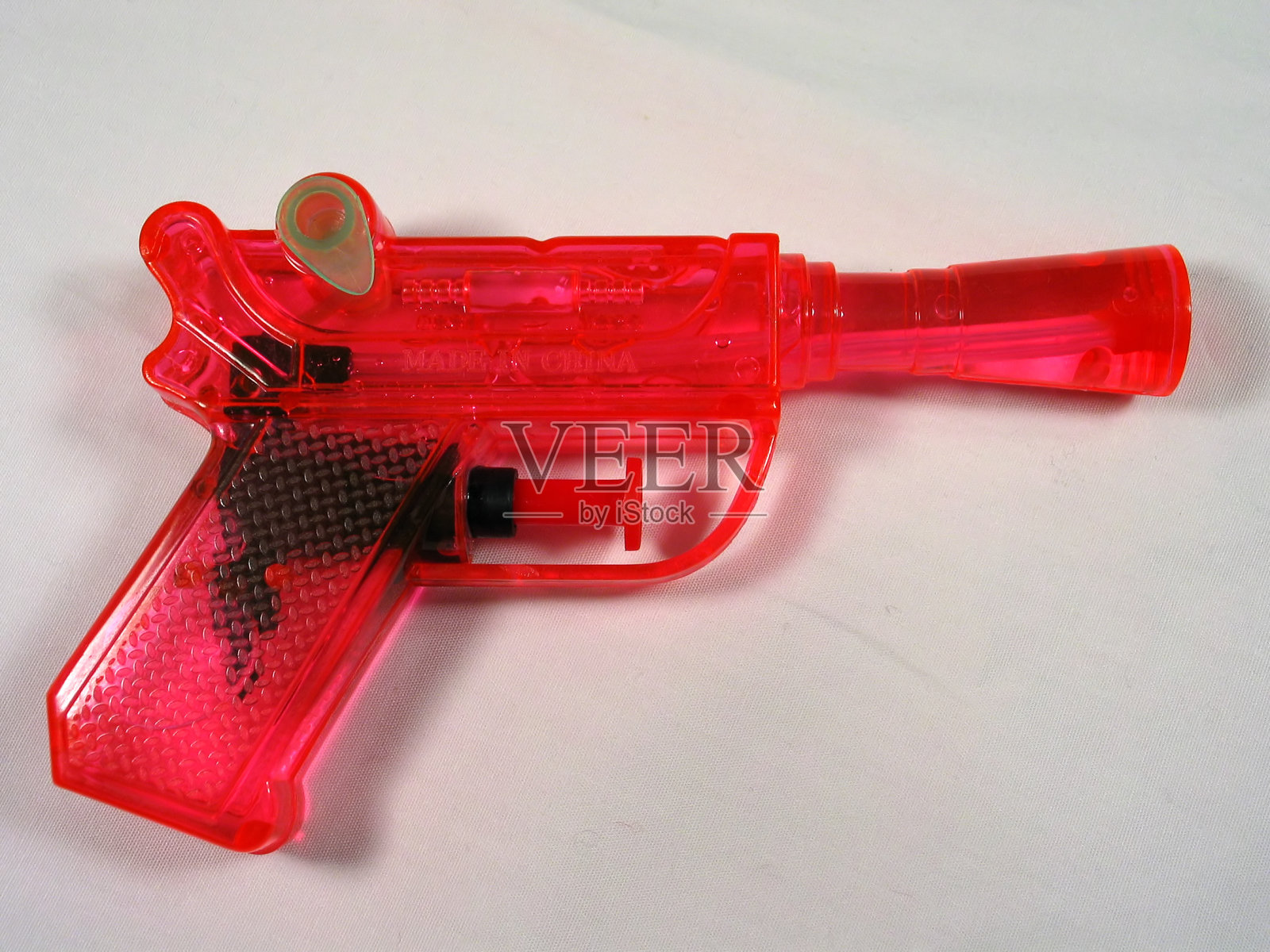 粉红色的水枪照片摄影图片