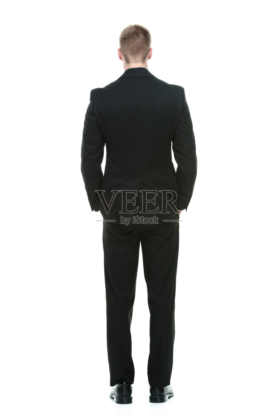 商人背向别处看照片摄影图片