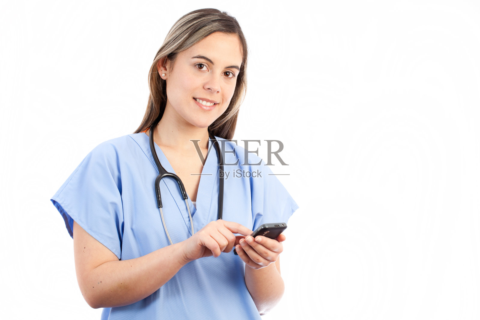 年轻女护士展示智能手机照片摄影图片
