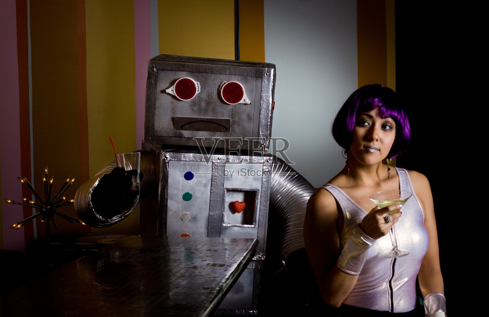 可悲的机器人和太空女孩照片摄影图片