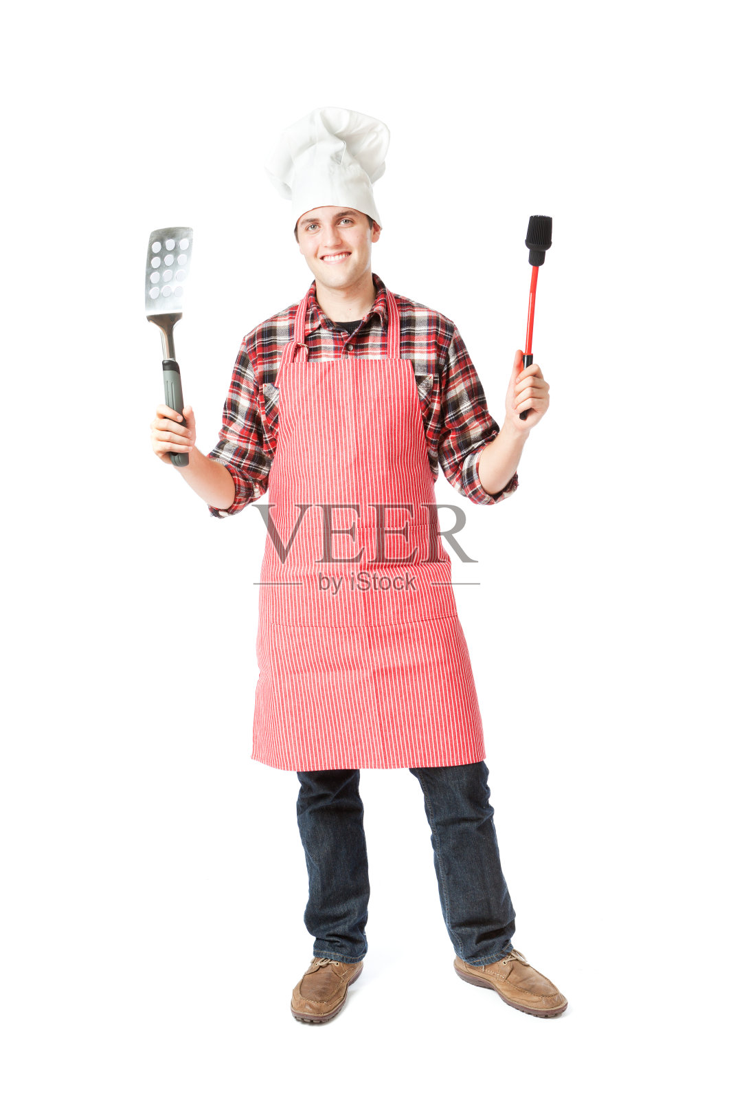 快乐站在烧烤厨师厨师摆姿势的白色背景照片摄影图片