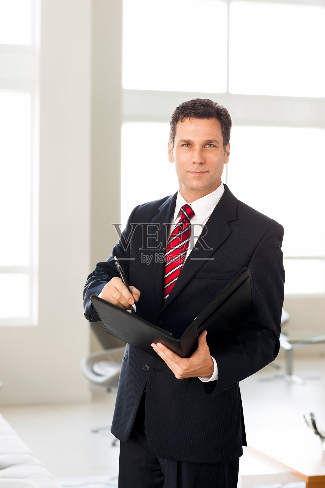 撰写投资组合的商人照片摄影图片