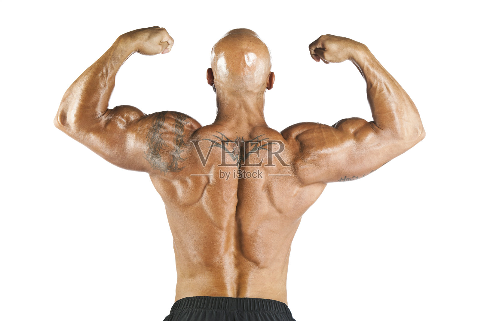 健美运动员摆姿势照片摄影图片