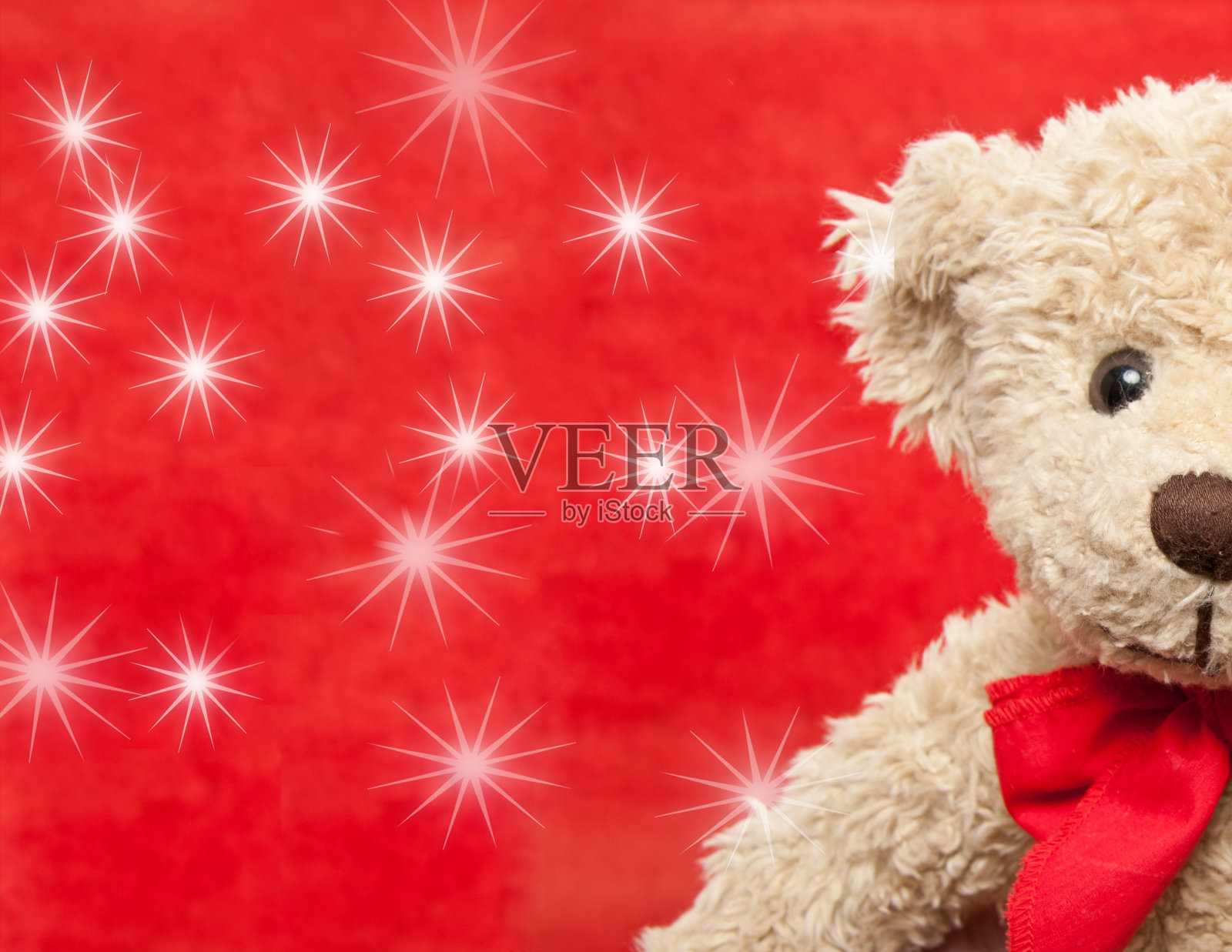 有星星的圣诞泰迪熊照片摄影图片