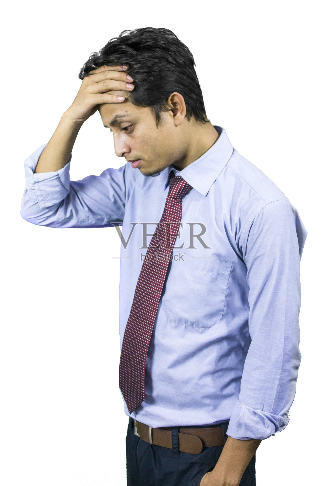 年轻的商人在悲伤。照片摄影图片