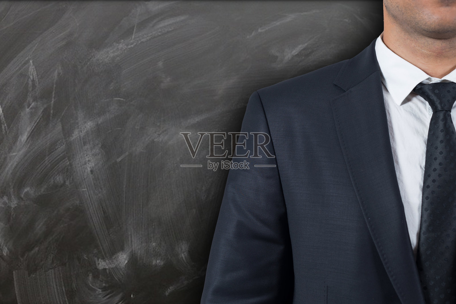 商人在黑色的黑板上照片摄影图片