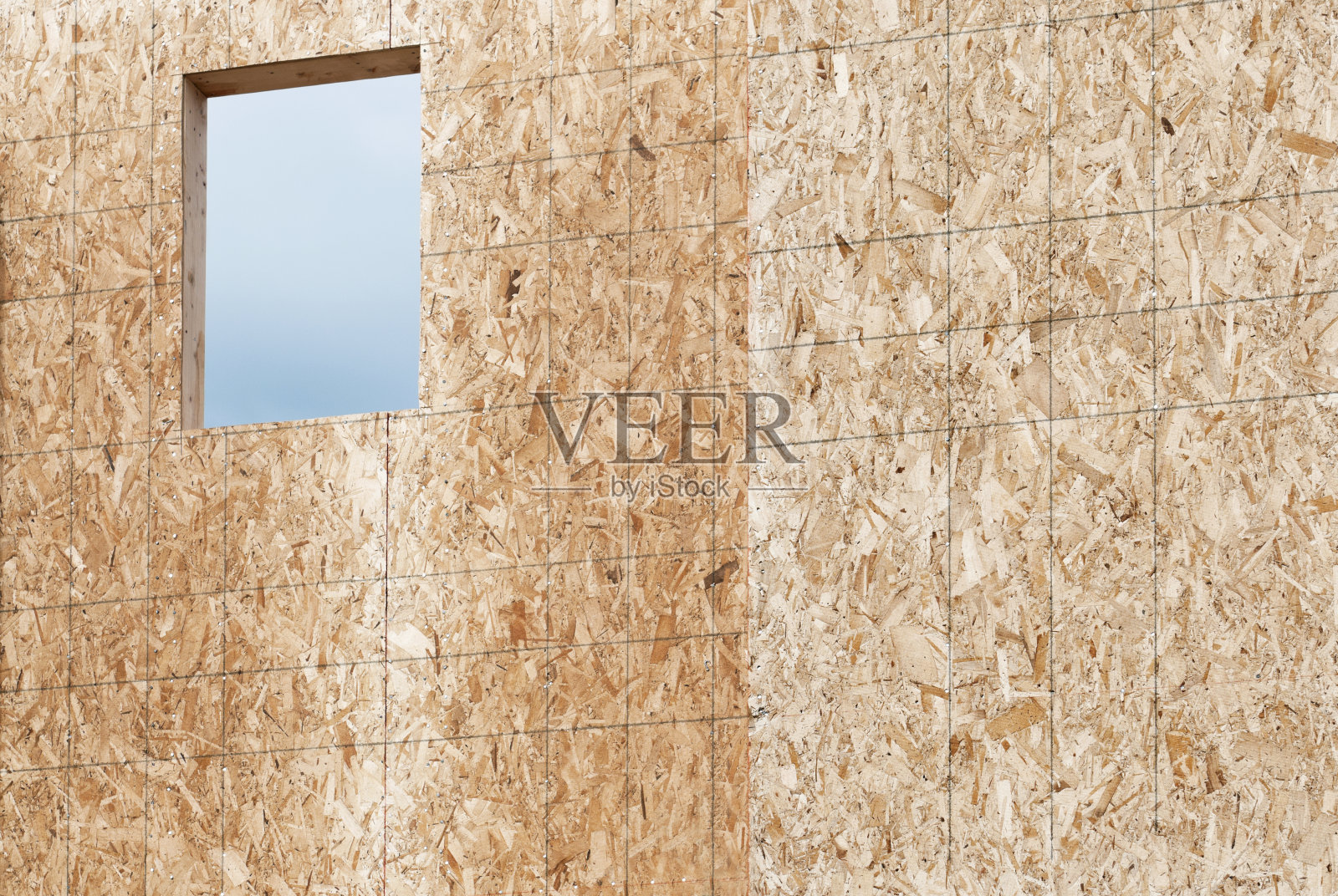 在新房子的纤维板墙上画的水平线照片摄影图片