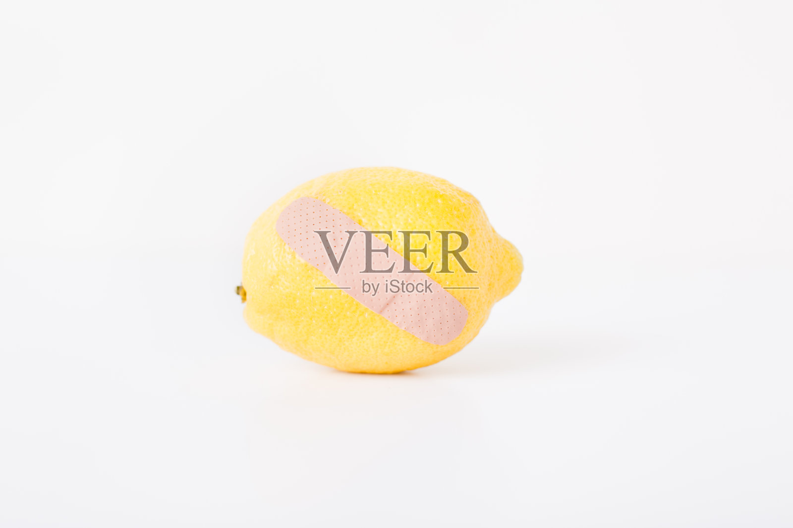 “柠檬援助”，柠檬贴创可贴的彩色图像照片摄影图片