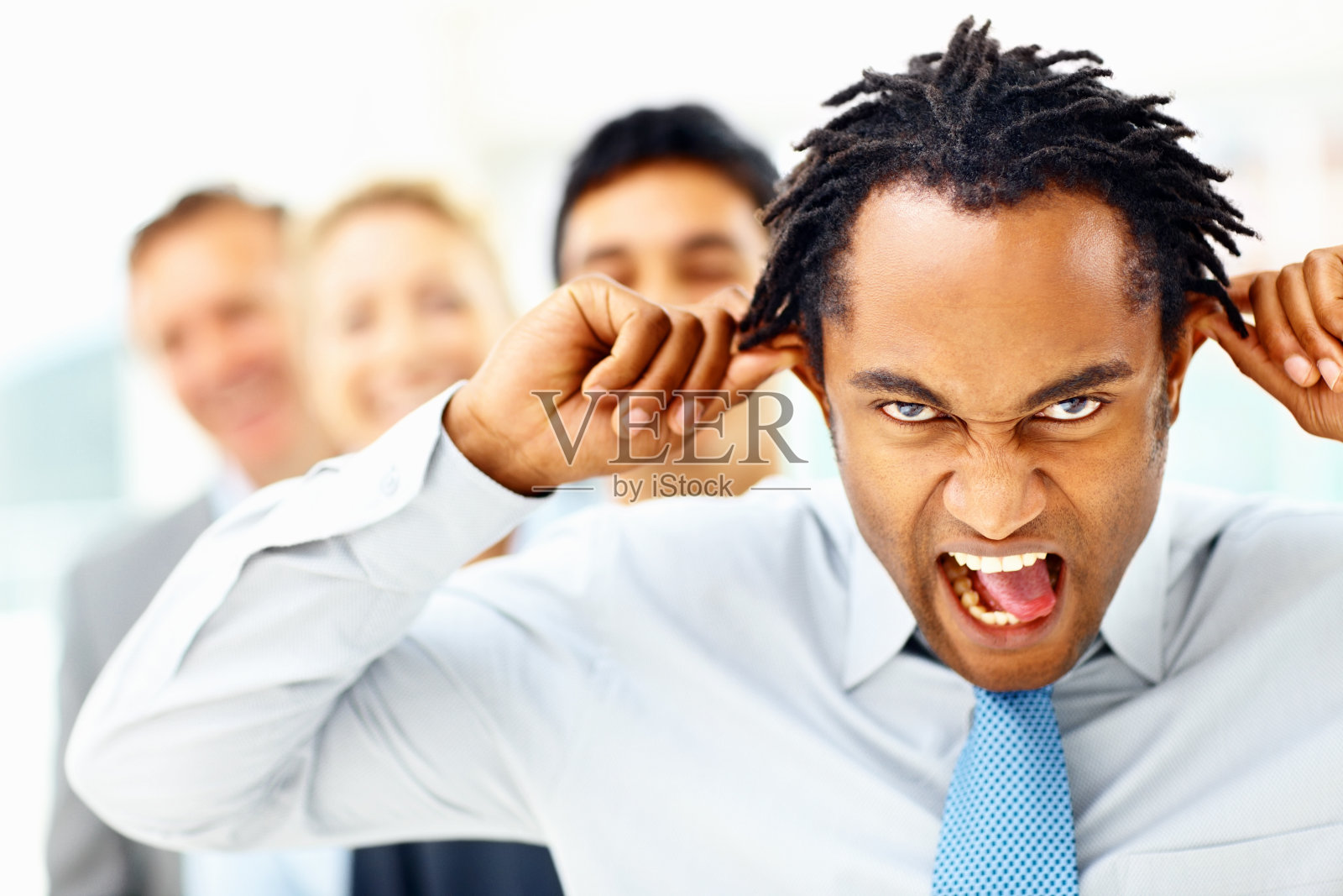 成熟，商业主管，面部表情滑稽照片摄影图片