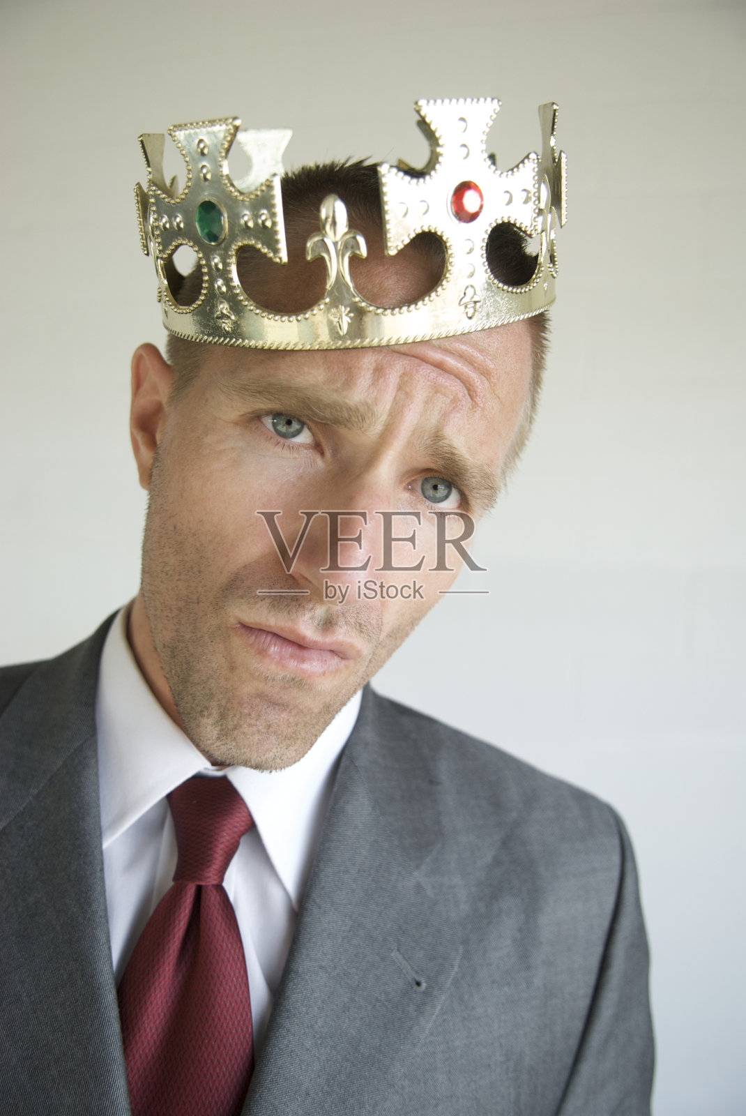 商人与皇冠给予态度照片摄影图片