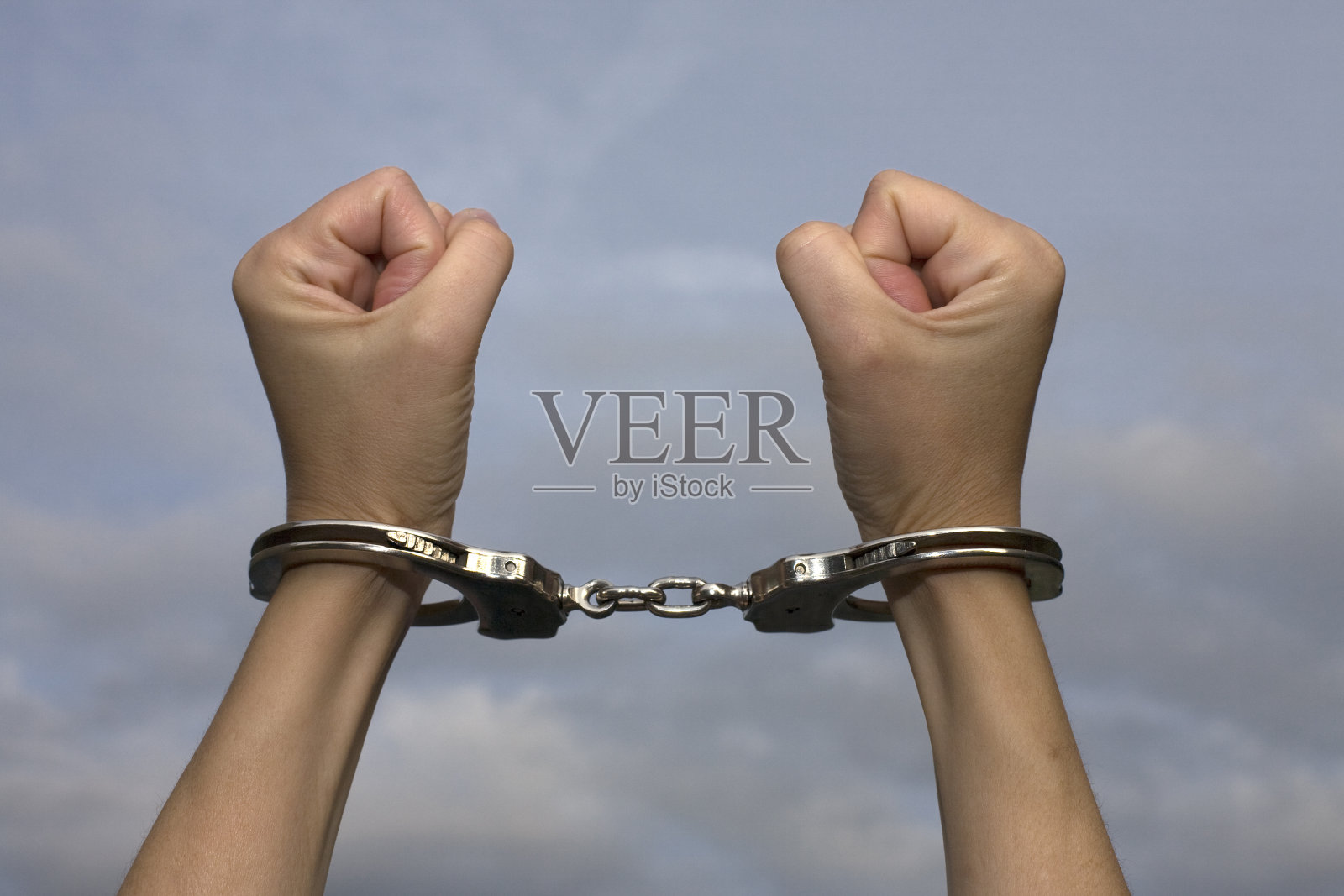 铐着愤怒的女人释放自由照片摄影图片