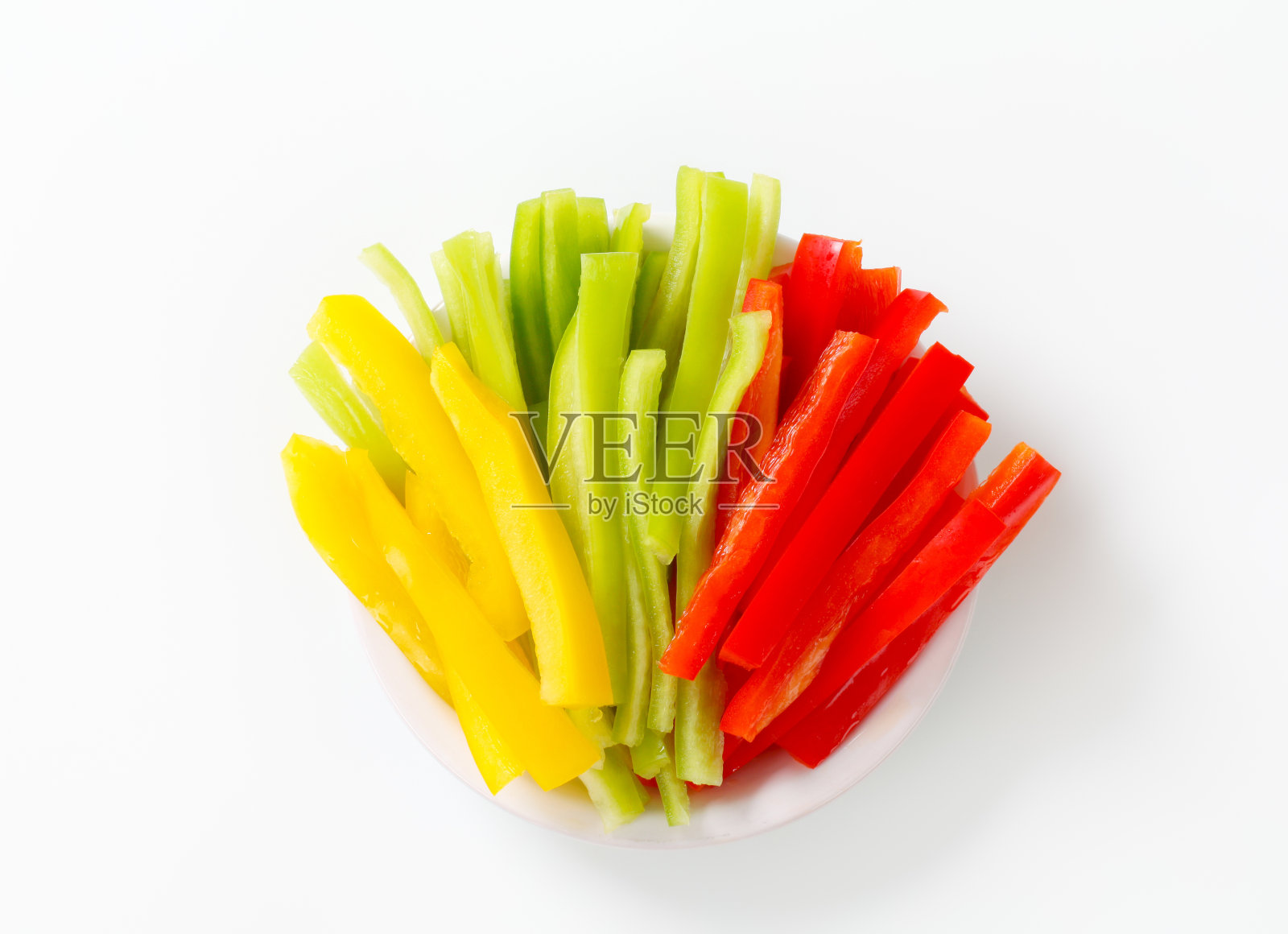 在碗中放入胡椒条纹照片摄影图片