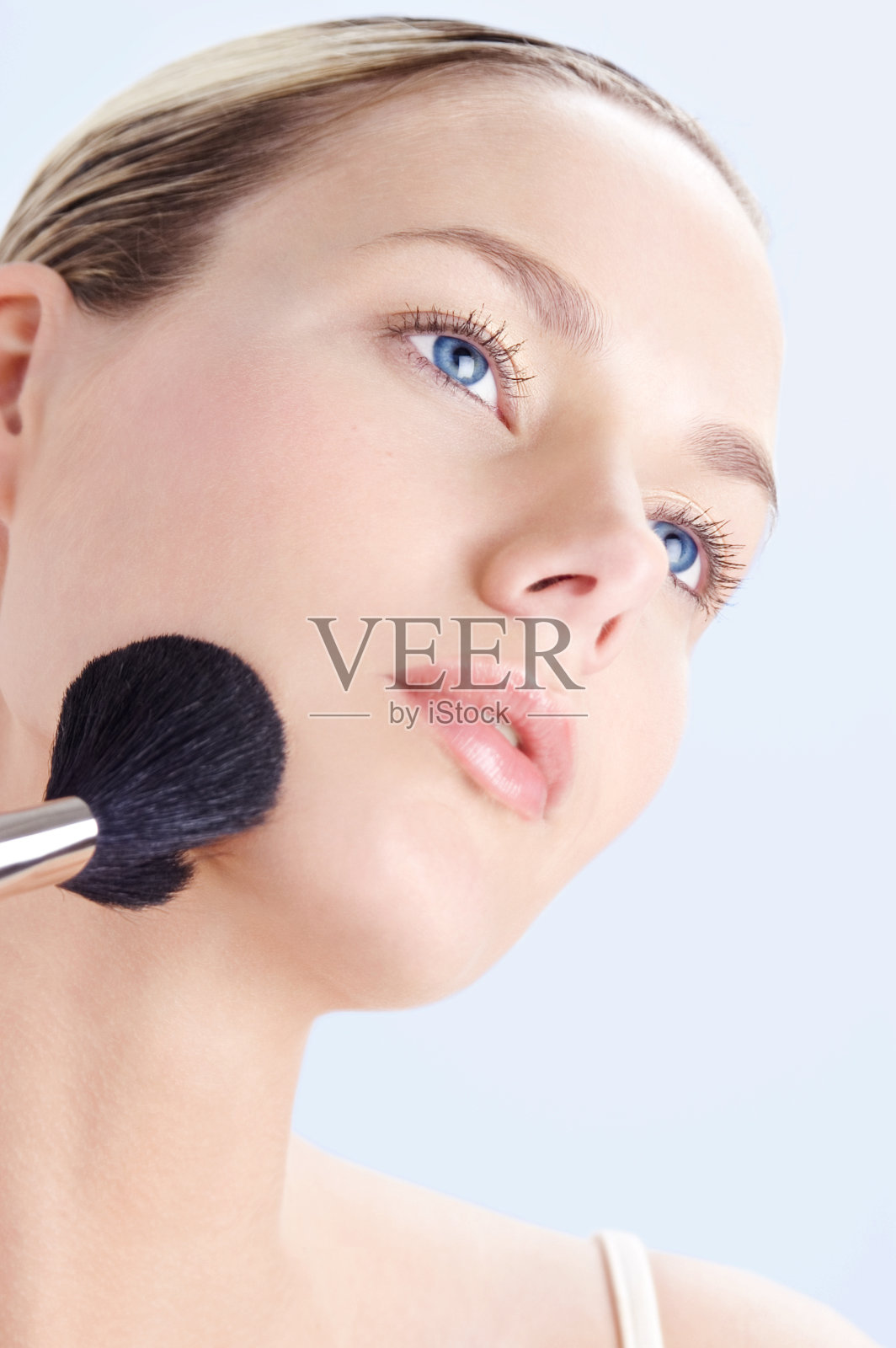 女人用粉刷照片摄影图片