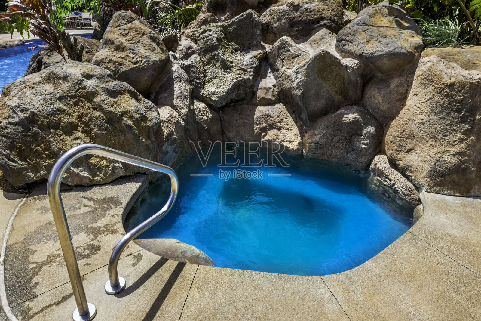 热带温泉浴池照片摄影图片