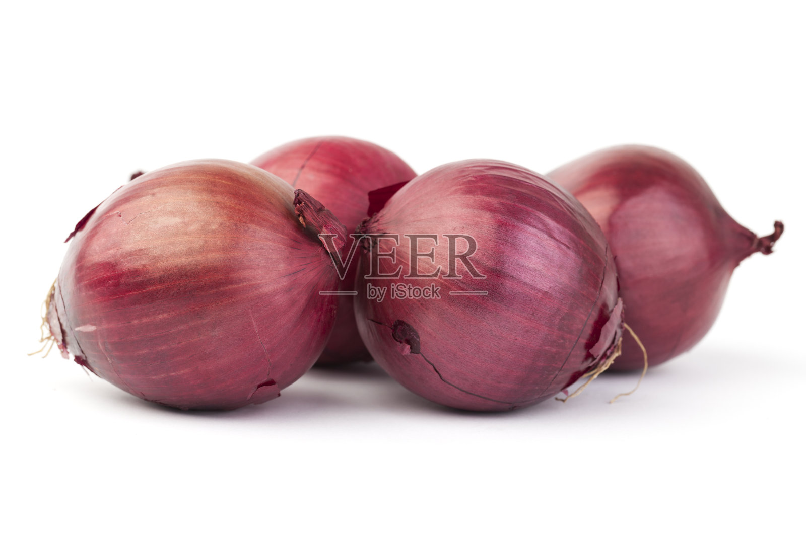 红洋葱孤立在白洋葱上照片摄影图片