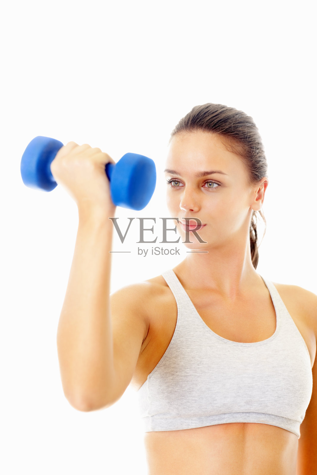 用蓝色哑铃锻炼的健康女性照片摄影图片