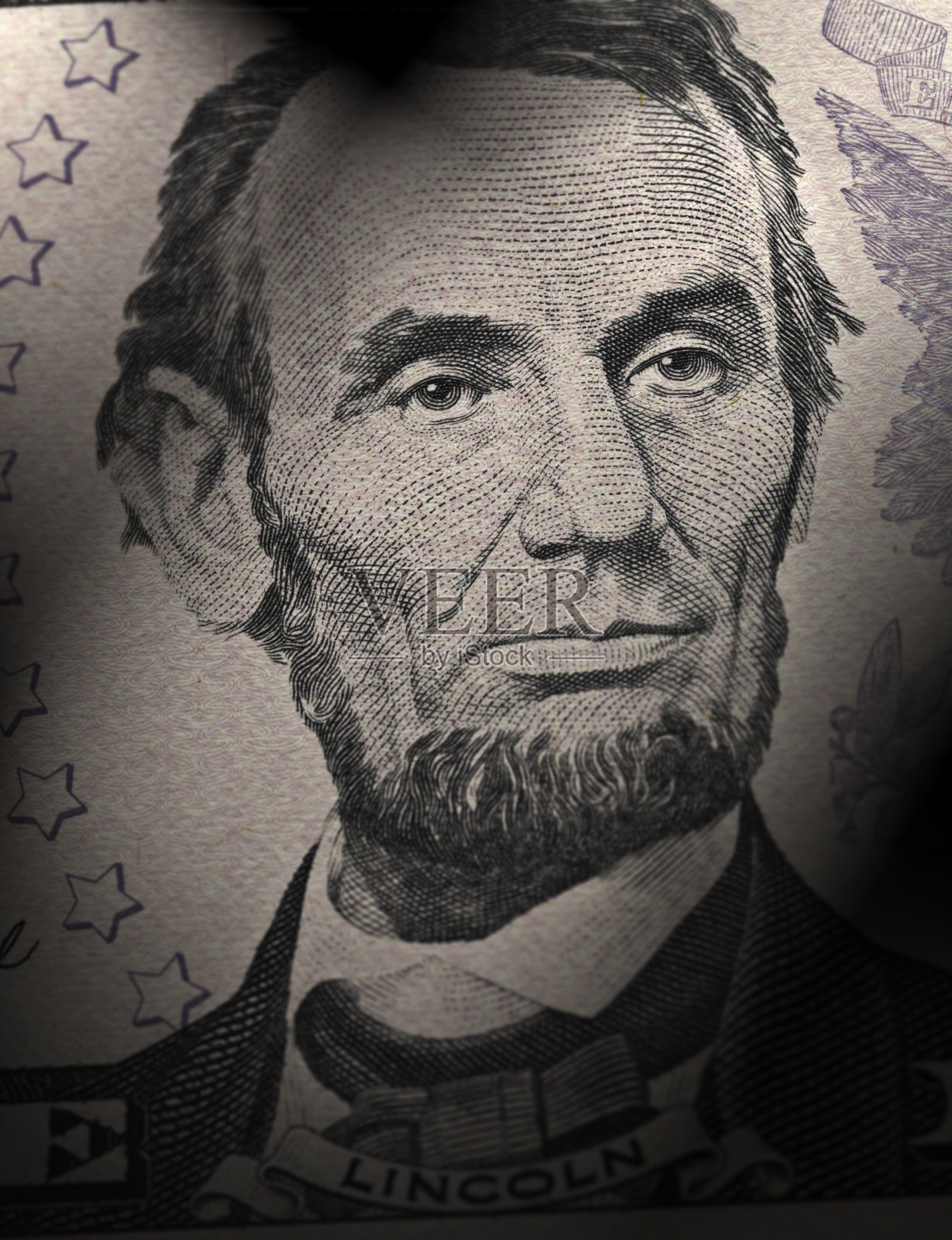 亚伯拉罕·林肯在一张五美元钞票上的特写照片摄影图片