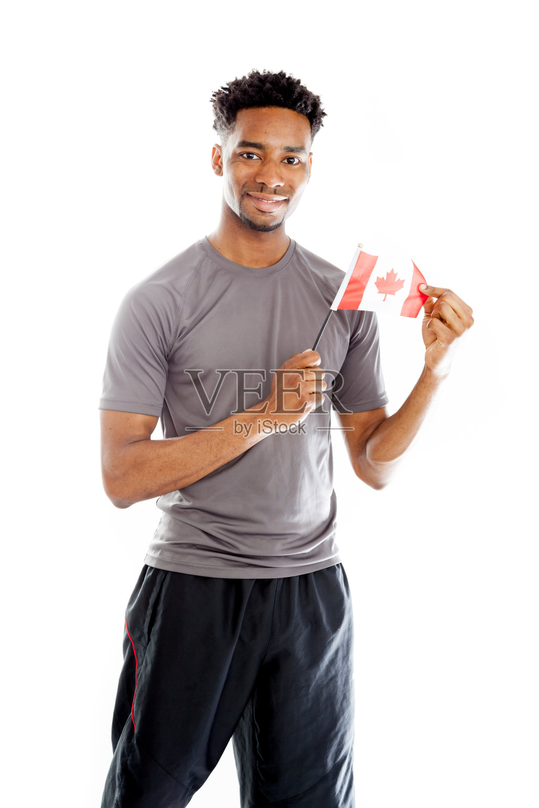 黑人美国人穿着一套运动服装，孤立在白色背景上照片摄影图片