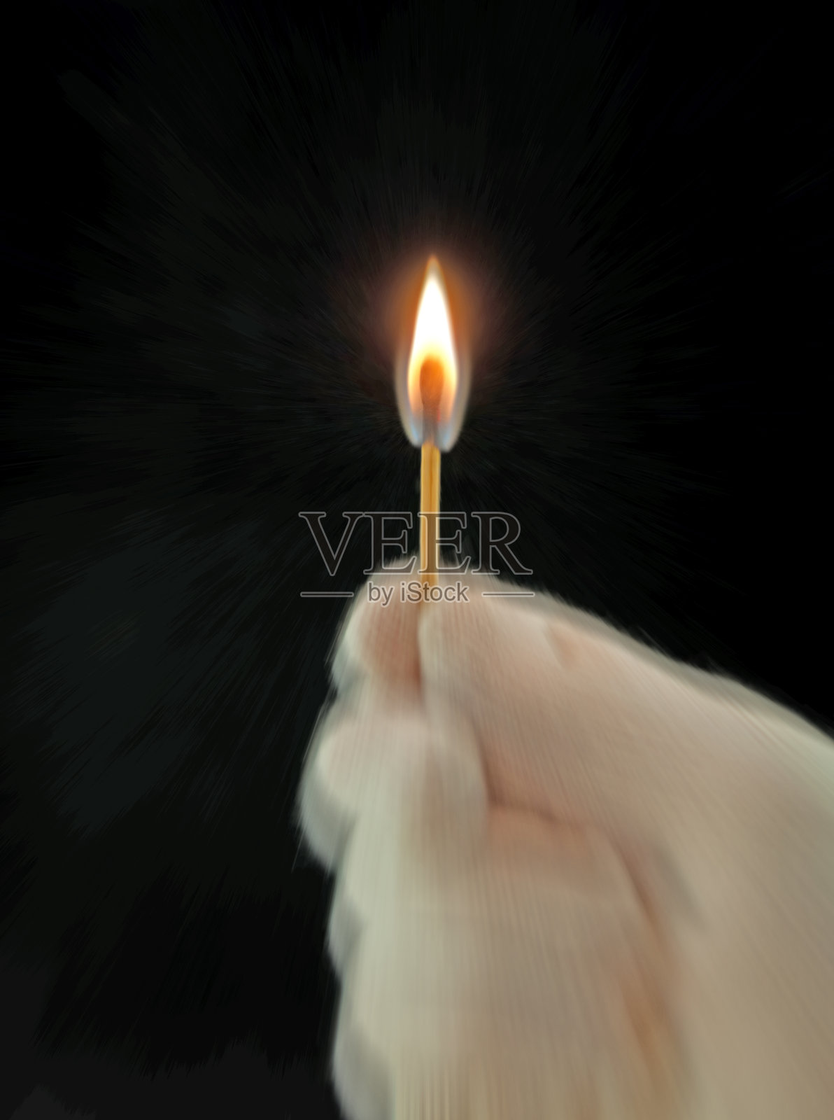 火红火柴-手持手套和变焦应用照片摄影图片