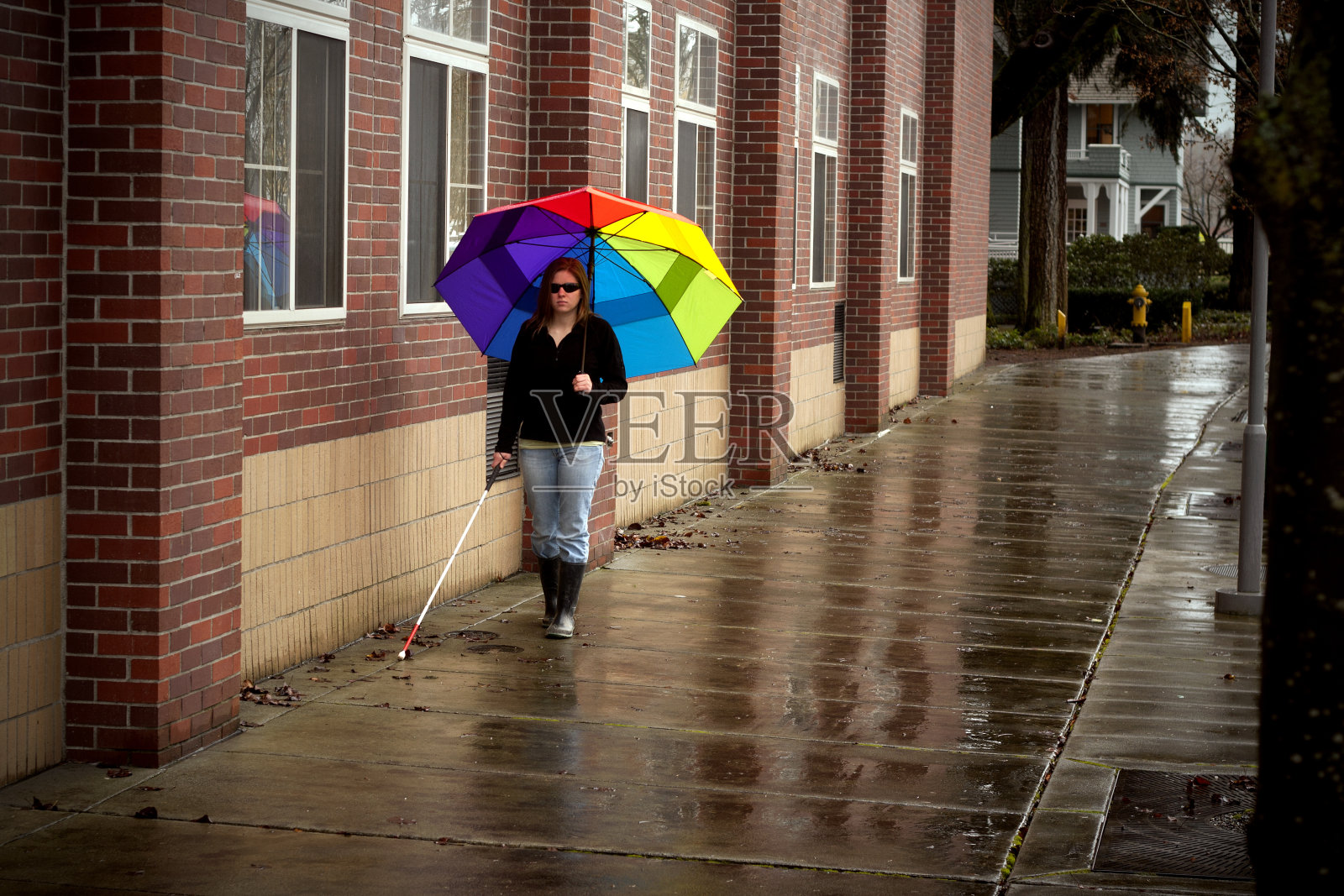 甘蔗用户与明亮的伞照片摄影图片