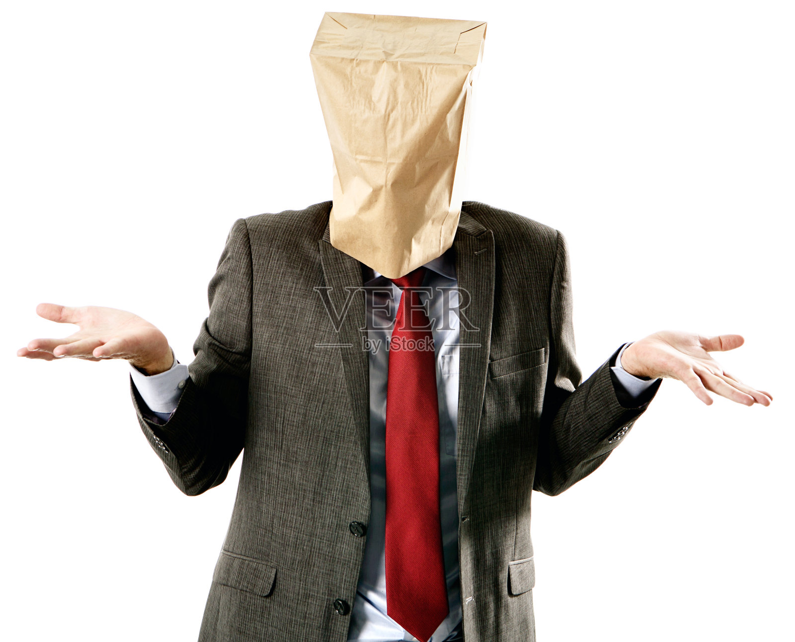 纸袋面具商人耸耸肩，困惑或不知道照片摄影图片