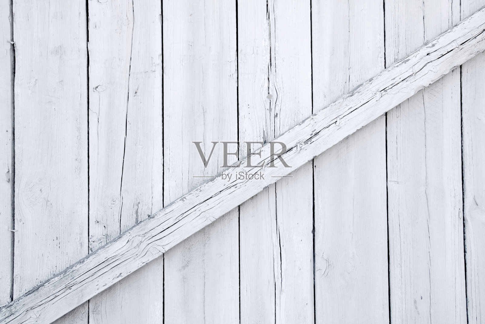 白色的木板墙上照片摄影图片