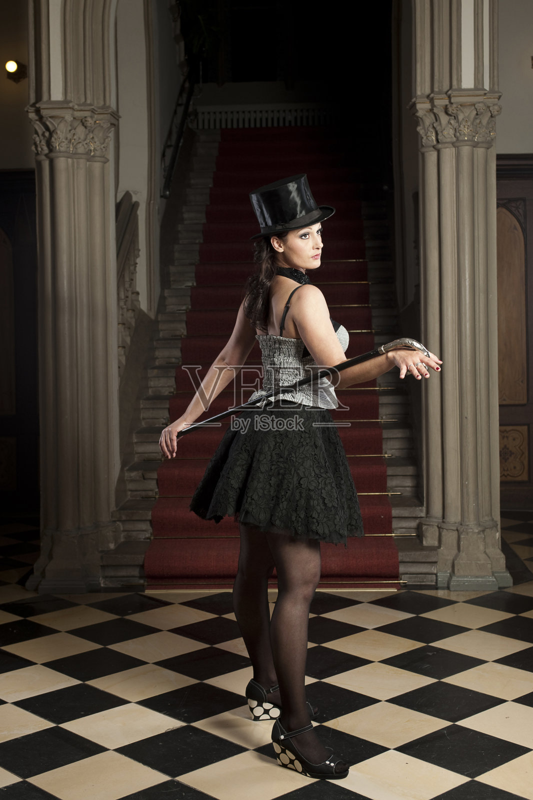 拿着手杖的歌舞女郎照片摄影图片