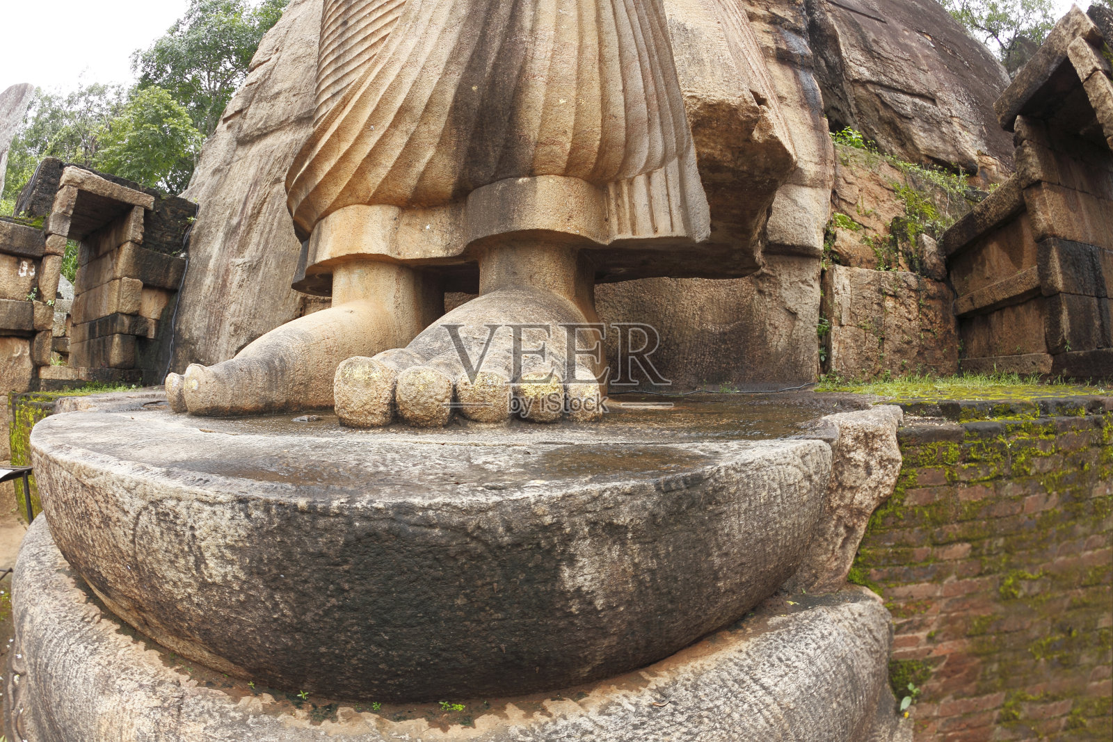 斯里兰卡古代佛像脚的特写照片摄影图片