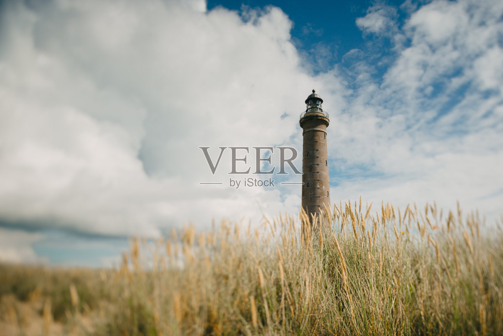 沙丘中的灯塔照片摄影图片