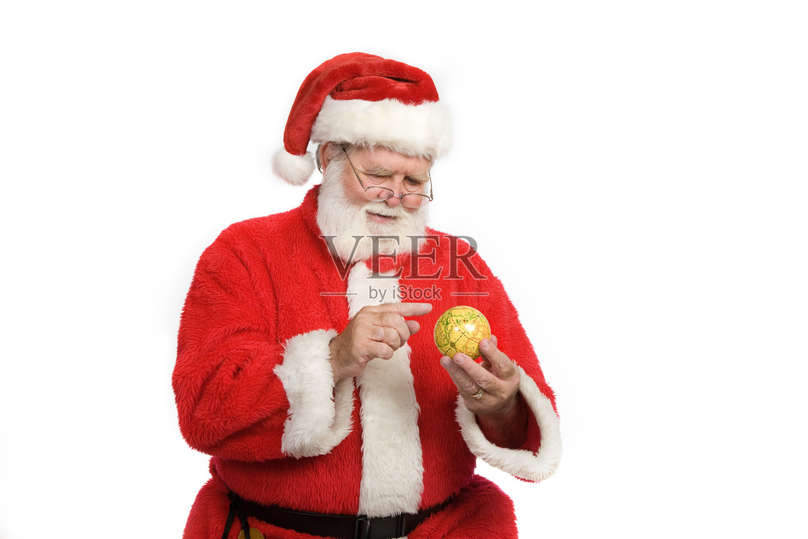 圣诞老人拿着地球仪照片摄影图片
