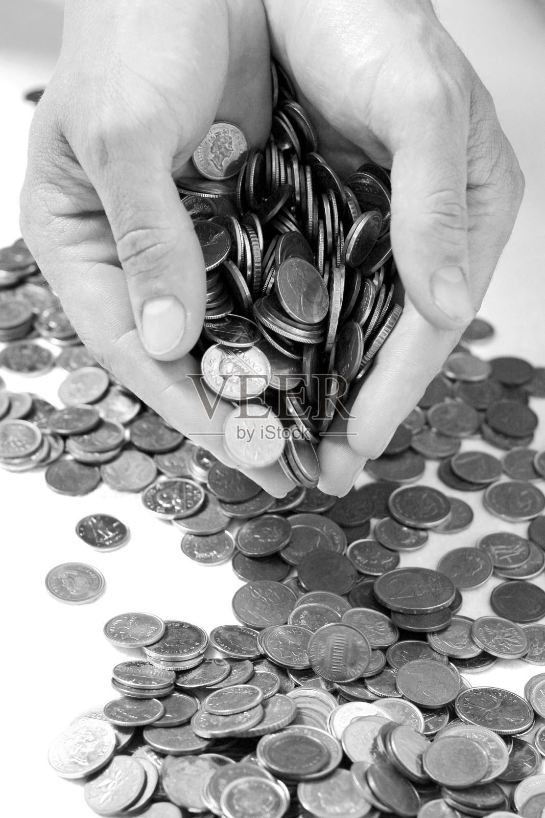 满手硬币照片摄影图片