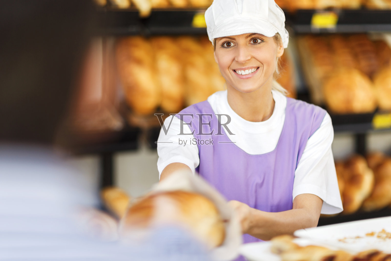 卖面包。照片摄影图片