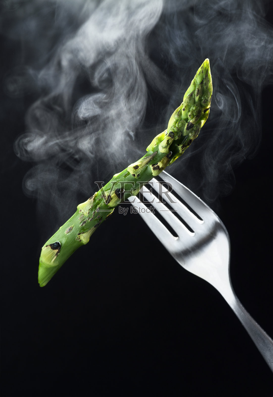 用叉子蒸芦笋照片摄影图片