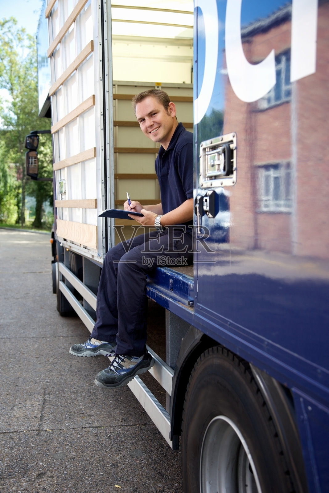 送货司机……照片摄影图片