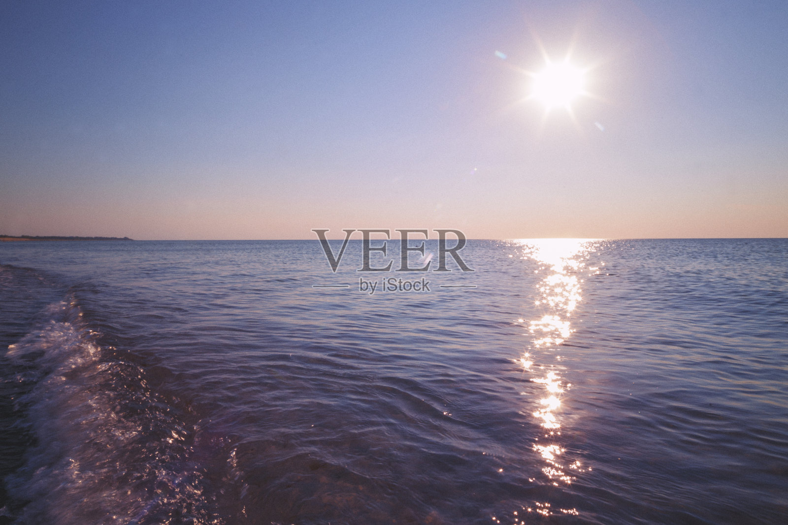 夕阳下的大海照片摄影图片