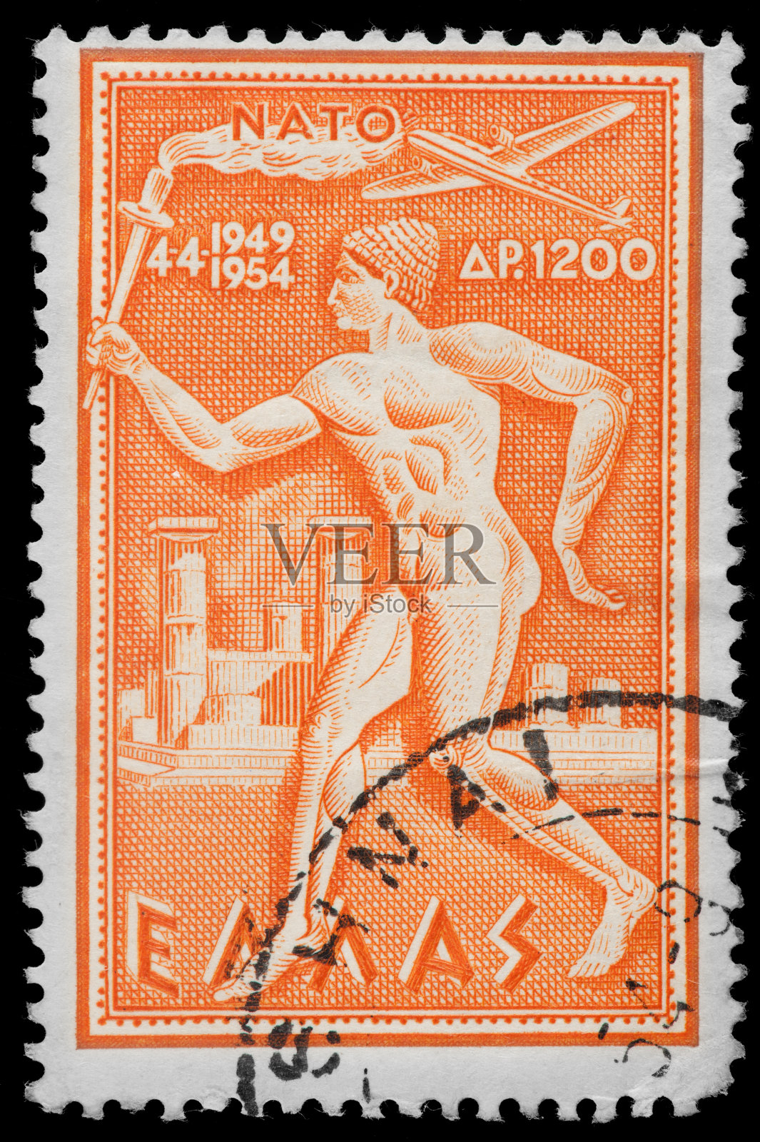 希腊老式邮票上赤裸的火炬手形象照片摄影图片