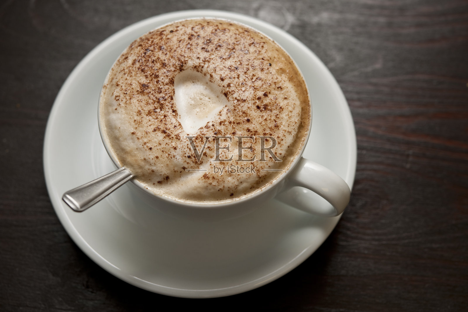 卡布奇诺加茶匙照片摄影图片