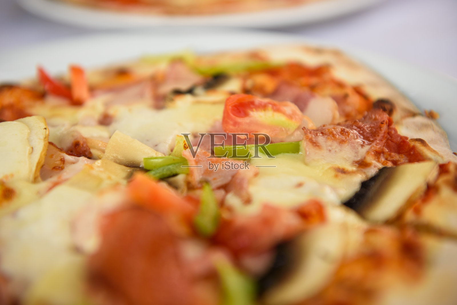 近距离的美味披萨照片摄影图片